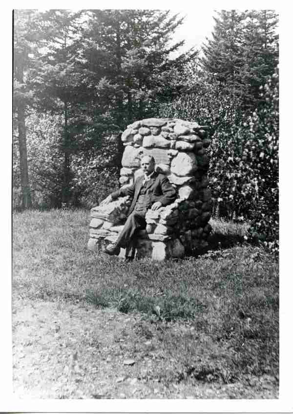 George Hinckley seated on the Black Wolf Chair (B&W)