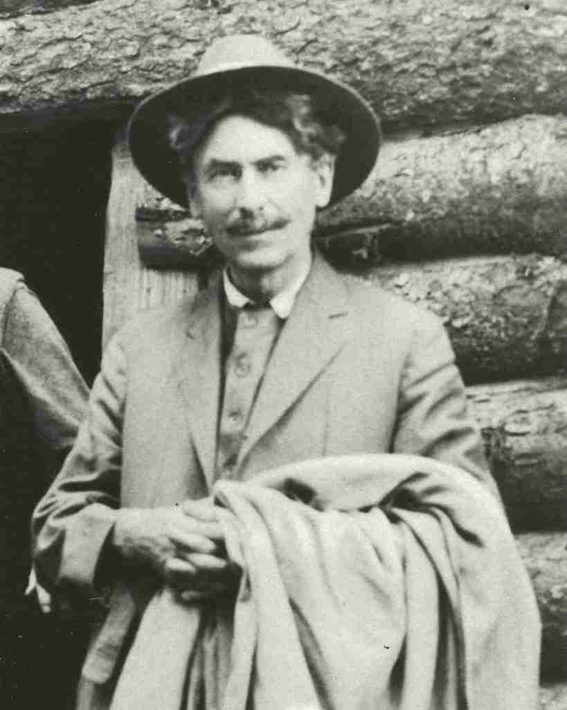 Ernest Thompson Seton in Front of Cabin (B&W)